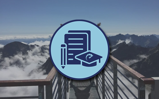 an image of a hiker above clouds and mountain tops