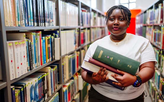 postgraduate student in the library