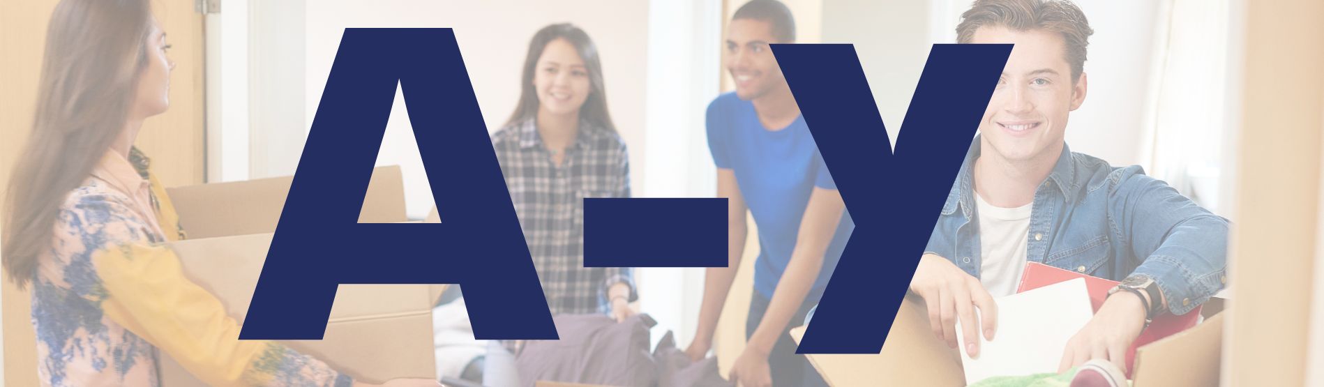 Students smiling behind A-Z letters