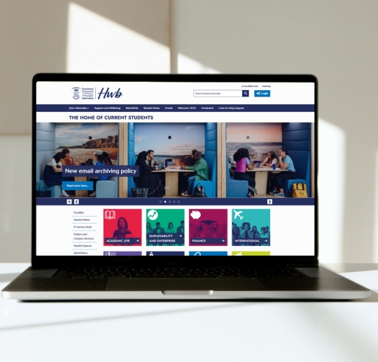 Open laptop with the MyUni website displayed on screen