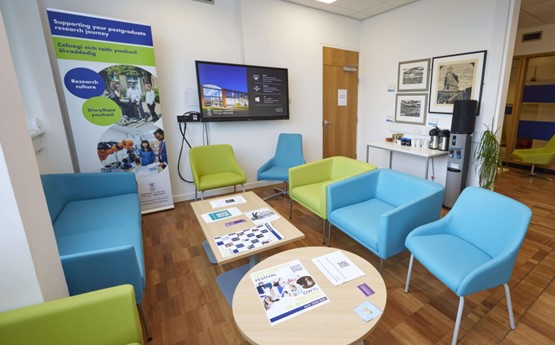 A room with brightly coloured furniture 