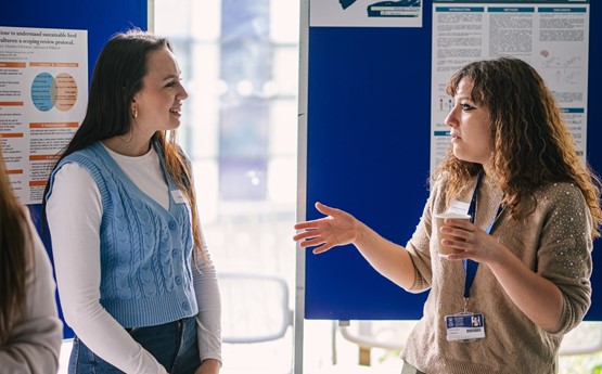 Woman speaking on stage